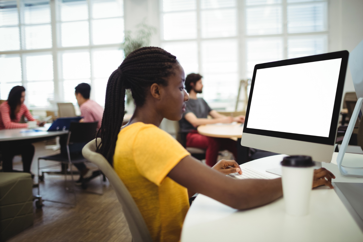 woman-using-computer-her-desk